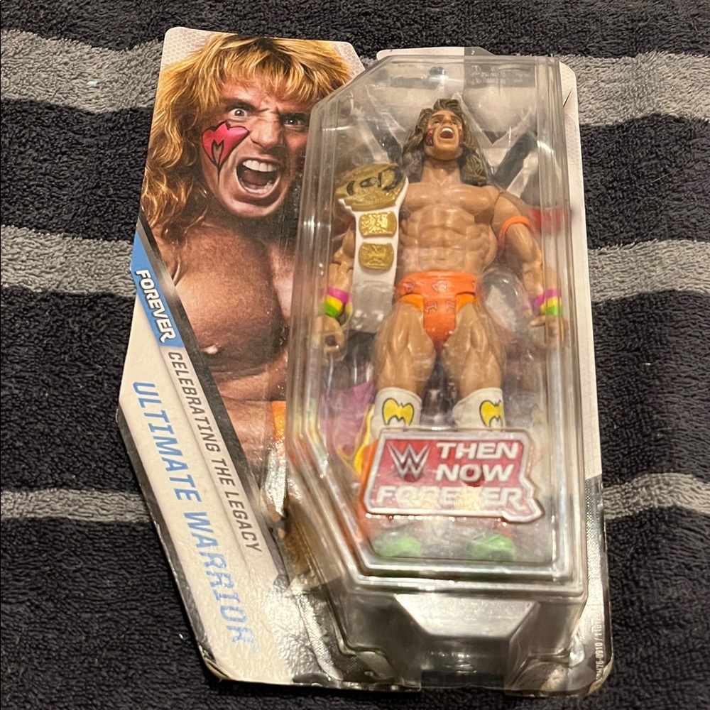 WWE Ultimate Warrior Action Figure with Orange Gear and Gold Belt